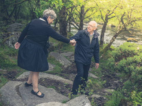 Senior couple walking in nature