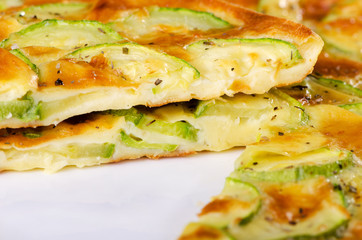Vegetarian meal, meatless pie with zucchini sectional close-up