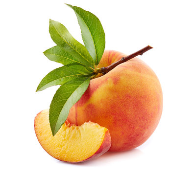 Ripe peach with leaves