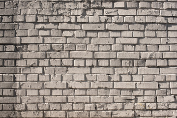 close-up view of white grungy brick wall textured background