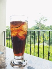 Cola with ice cubes