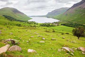 Fototapeta na wymiar Wast Water lake, view from the path on the way to Scafell pike, the highest mountain in England, Lake District National Park, England, selective focus