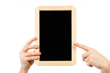 woman's hands holding a blackboard publicity