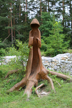 Wooden sculpture in the mountains 