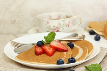 Homemade Buckwheat pancakes served with berries, selective focus