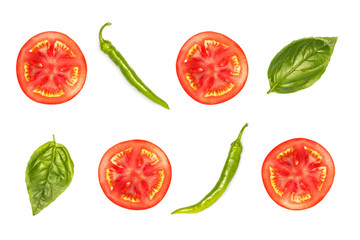 slices of tomato with peppers and basil