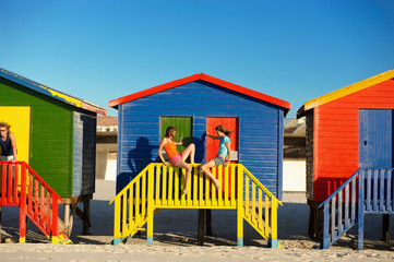 Girls hanging out at beach hut