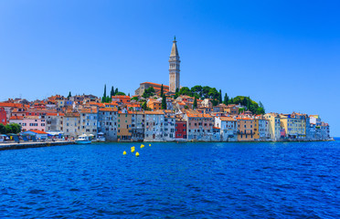 Fototapeta premium Wonderful romantic old town at Adriatic sea. Boats and yachts in harbor at magical summer. Rovinj. Istria. Croatia. Europe.