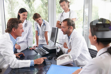 Doctors meeting to discuss files