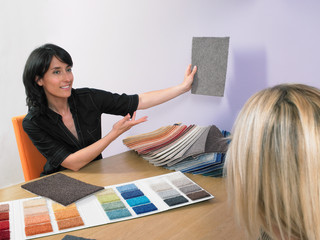 Designer showing carpet samples