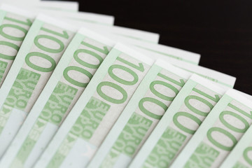 Close-up of 100 Euro banknotes. Shallow dof