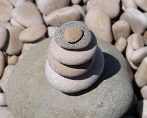 stack of pebbles balance harmony zen - ocean sea or river, summer vacation