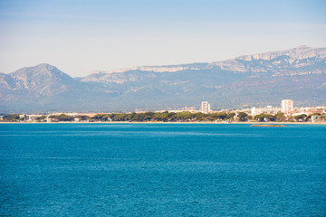 Seascape and the main beach of Costa Dorada, Tarragona, Catalanya, Spain. Copy space for text.