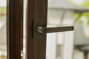 Handle of modern plastic window. Closeup shot