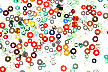 Colorful glass beads isolated on white background.