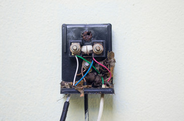 ground wire cable connection out door,	getting to the ground,	to prevent the danger of lightning and beyond,	tree copper wire main connection and waste include, blur background.