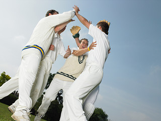 Cricketers celebrating