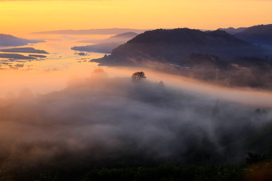 Sunrise over the mist in the mountains at sunrise over the mountains in Thailand sunrise