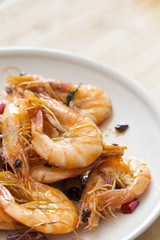 Delicious seafood shrimp closeup on a plate.