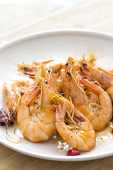 Delicious seafood shrimp closeup on a plate.