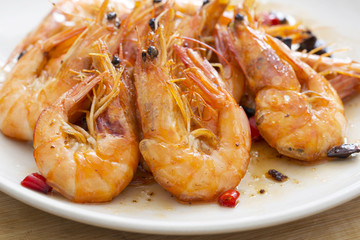 Delicious seafood shrimp closeup on a plate.