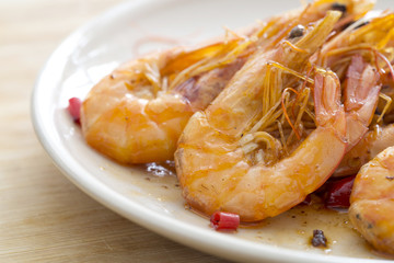 Delicious seafood shrimp closeup on a plate.
