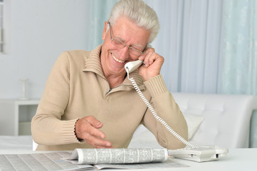 Senior man talking on the phone