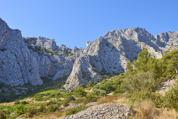Rocks and mountains of Hvar island.  Hvar island is popular touristic destination at Croatian coast.