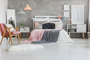 Handmade pillow on bed