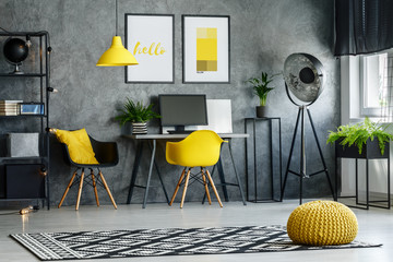 Modern furniture and yellow accents