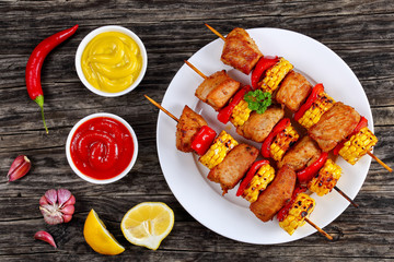 hot Grilled pork meat with corn cob slices