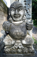 Fototapeta na wymiar A God statue at ancient Hindu temple