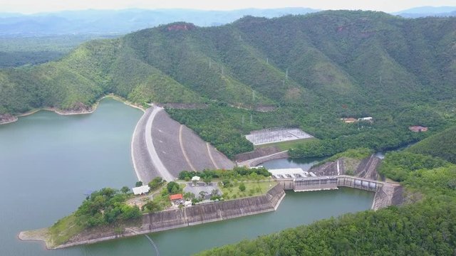 Aerial shot with from a drone of Srinagarind Dam in Kanchanaburi Thailand. It is used for river regulation and hydroelectric power generation.
