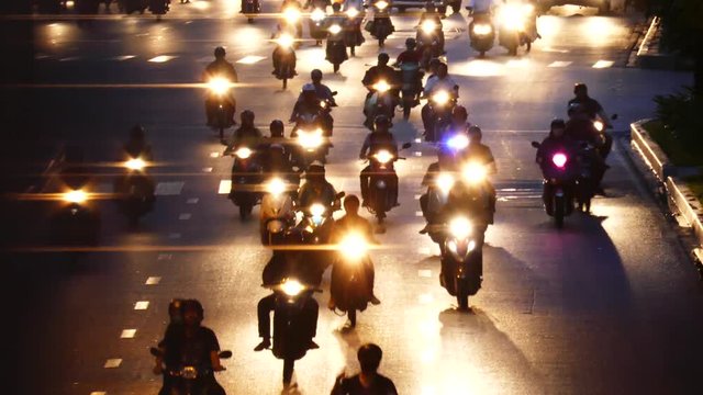 HO CHI MINH, VIETNAM - MARCH 18 2017: Rush hour, traffic sound. Thousands of motorcycles and car crowd the streets of Ho Chi Minh City also known as Saigon, the largest city in Vietnam