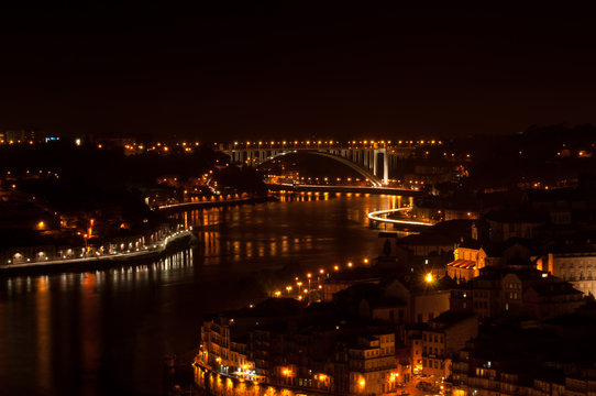 Night view on the Porto city in Portugal and the Duoro river