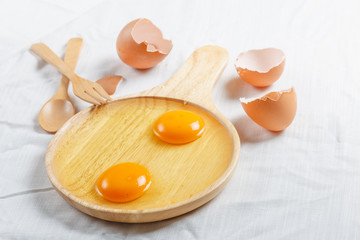 york egg in wood plate