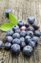 Fresh blueberries on old wood table