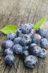Fresh blueberries on old wood table
