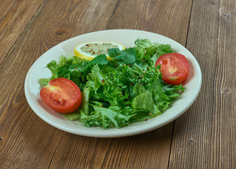salad from leaves of wild radish