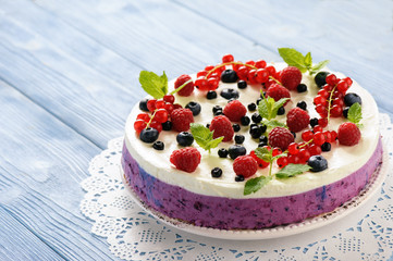 Berry cheesecake with currants, blueberries and raspberries.