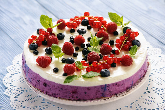 Berry cheesecake with currants, blueberries and raspberries.