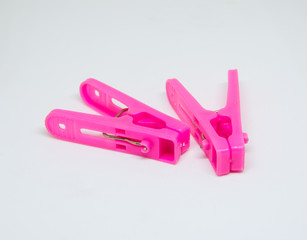 Pink Cloth clamp on white background