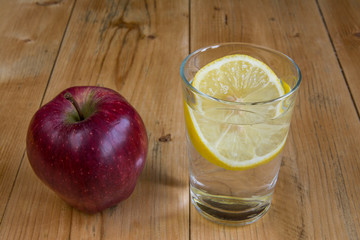 Apple and water drink with lemon