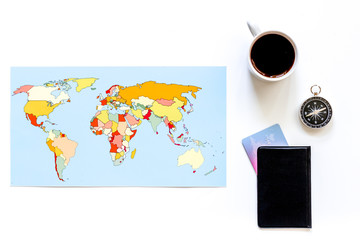 Planning trip. World map, compass and bank card on white background top view