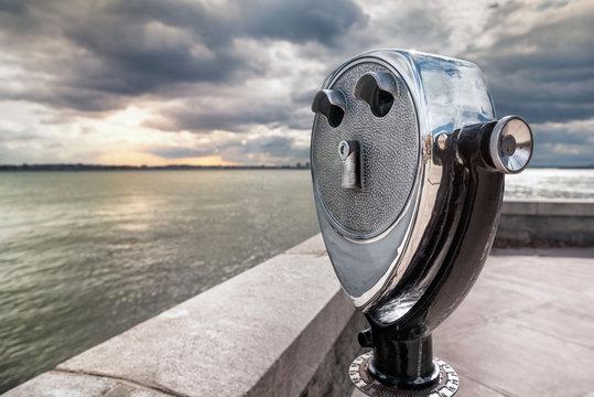 USA, New Jersey, coin operated binoculars on Ellis Island
