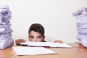 child on the school desk studying