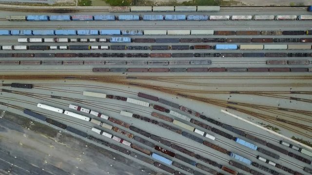 4K The long train wagons on the rail tracks