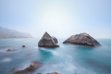 seascape with rocks and mist