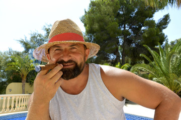 El se&ntilde;or con puro y sombrero