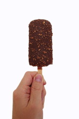 Hand holding Ice cream covered with chocolate and nuts isolated on white background. Summer and holiday. Hot day. Delicious ice cream lolly.